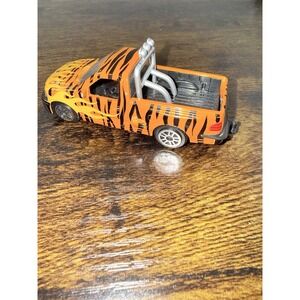 Maisto Ford F-150 SVT Lightning Tiger Stripe Pickup Truck 1:24 Diecast Orange